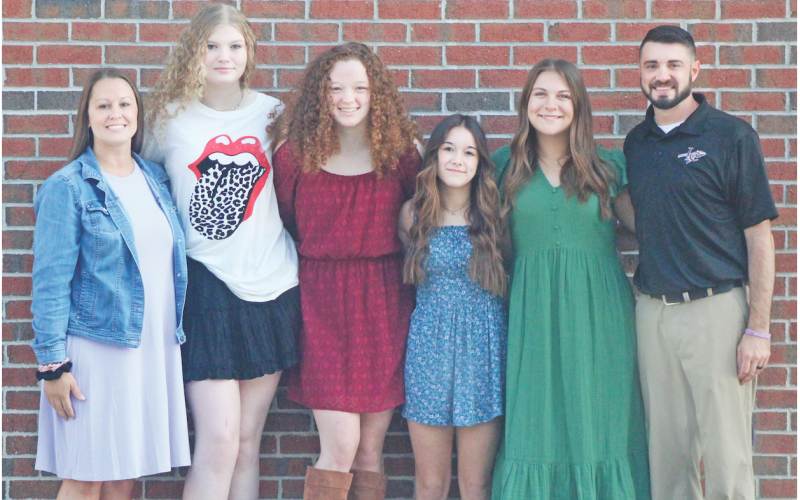Girls wrestling Assistant Coach Jessi Askew, wrestlers Maxine Sullens, Nora Garbuzovas, Cadence Grulla, Gwendalyn Wight and new Head Coach Scott Degraff attended the Sunrise Rotary meeting last week.