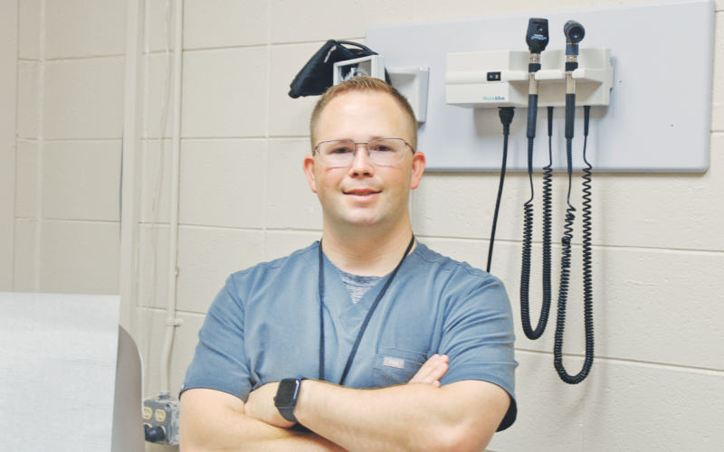 Kevin Jackson, FNP-C, is ready to see his next patient at the new Healthy Kids+ clinic. The facility, located in the former Lumpkin Elementary offices, is designed to meet primary health care needs for students, teachers and parents in the local school system.