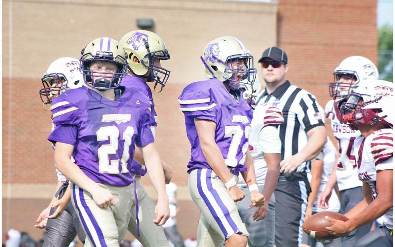 Dominick Alvarez and Xander Nielsen celebrate a big tackle for the Indians during this week’s game.