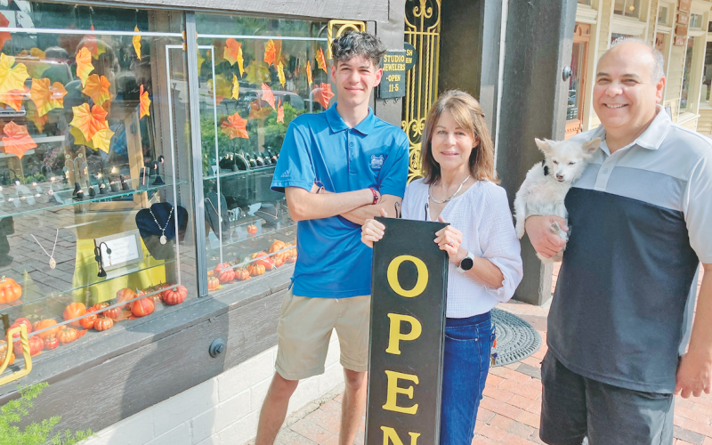 Once again, the Studio Jewelers shop on the Public Square is open for business as new owners Bill and Carol Lucker, along with their son Harrison and dog Gia, are settling into their new hometown. (Photo by John Bynum)