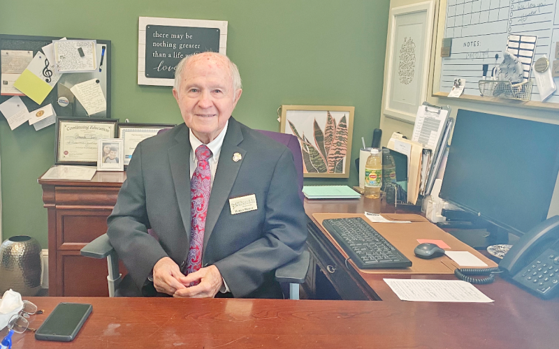 Dahlonega Funeral Home staff member Homer Doster awaits an opportunity to comfort grieving families. (Photo by Sarah Steed)