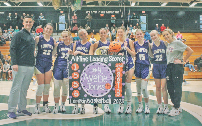 The Lady Indians Basketball team celebrates Averie Jones’ huge accomplishment of breaking the all-time scoring record. (Photo by Eligha Roper))