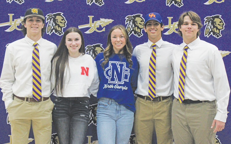 Lumpkin County’s Harper Davenport, Maddy Moyer, Averie Jones, Alejandro Narvaez and Hayden Gilbert celebrate their big accomplishments.