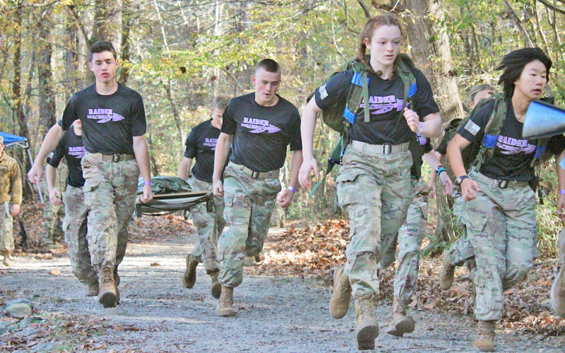 The Raiders squad competes in the Cross Country Rescue event during the All-Service State Championships.