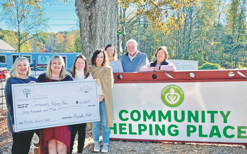 North Georgia Community Foundation President Michelle Prater (pictured, from left) presents a grant check in the amount of $60,000 to Community Helping Place to establish a new Mobile Service Unit. Also pictured are CHP Executive Director Melissa Line, Abigail Carter, Paula Payne, Debi Holloway, CHP Board Chair Brian Hinkel and Barbara Williams.