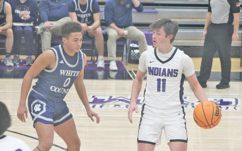 Lumpkin County's Jac Chambers looks for an opening against the Warriors.
