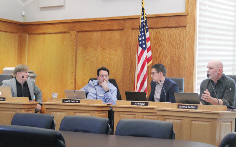 Mayor Pro Tem Roman Gaddis explains the conditions set forth by the City Council in order to approve 20 new condo units on Alicia Lane.