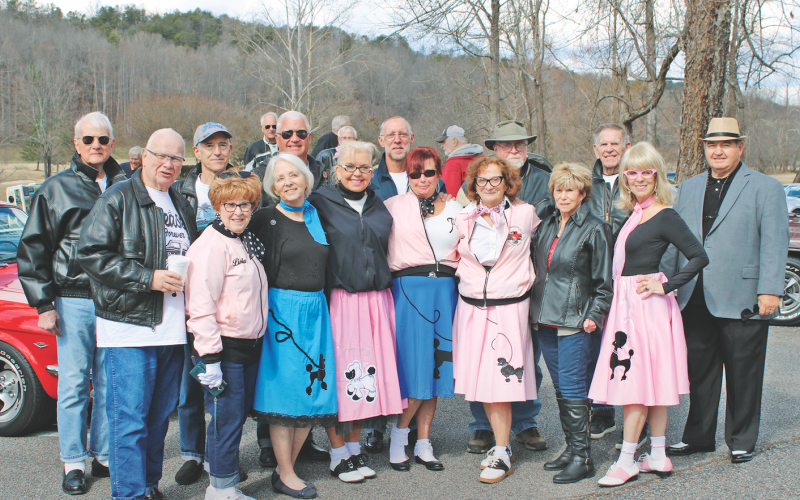 Pictured are (men, left to right): Lew Houser, Jim Carroll, Dave Moore, Brian Towns, Joe Comfort, John Bayne, Bill Morris and Luke Lucarelli.  (Women, left to right): Linda Carroll, Ann Moore, Deb Towns, Gail Dowsett, Millie Bayne, Kathy Morris and Diane Houser.