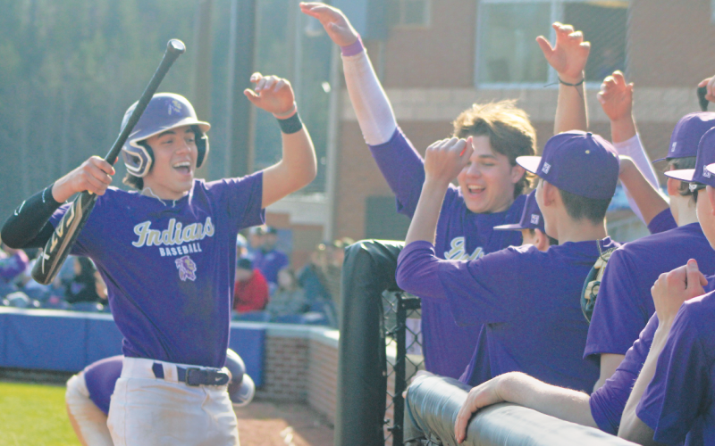 Chase Smith and the purple squad celebrate a run during their preseason game.