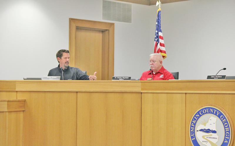 Commissioner Tucker Greene (left), who also served on the County’s recycling committee, elaborates on the group’s recommendations during a recent work session alongside Commissioner Dr. Bobby Mayfield.