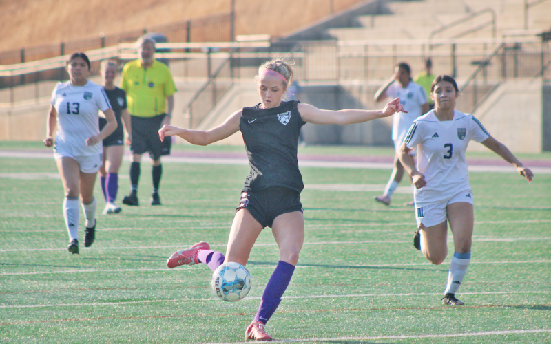 Lumpkin County’s Kaitlyn Johnson sets up a shot against West Hall.