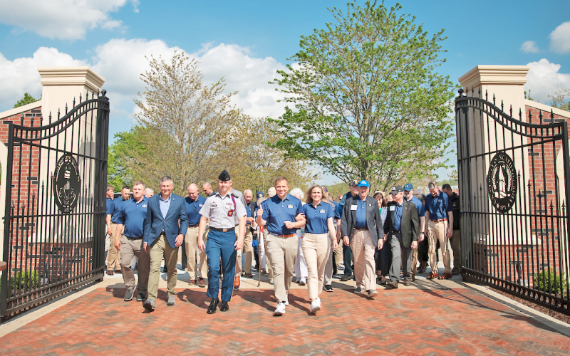UNG President Michael Shannon and First Lady Jessica Shannon lead the way through the new gates on the drill field in Dahlonega. (Photo courtesy of UNG)