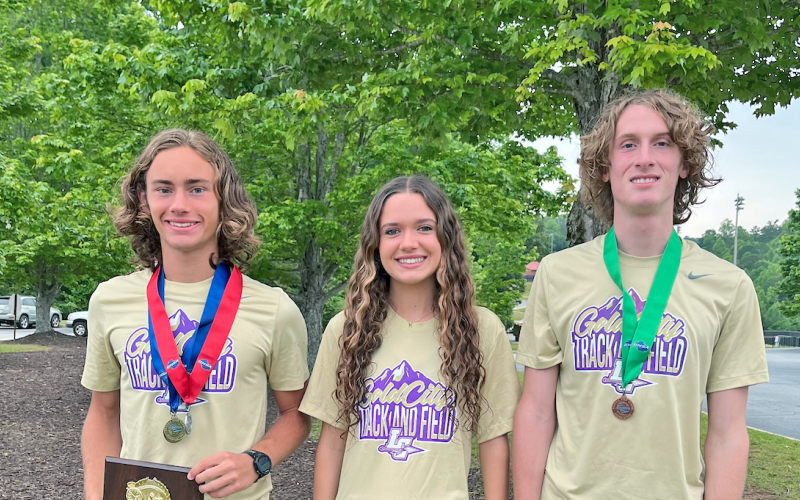 The State Finalist trio of Wyatt Windham, Keli George, and Ben Sherrilll show off their newly-earned hardware from the GHSA track State Meet.