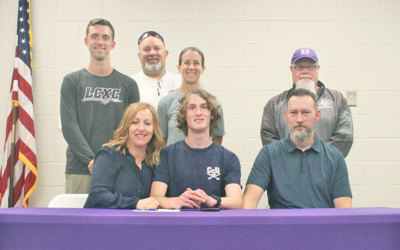 Ben Sherrill committed to Division I school Charleston Southern University surrounded by his loving and supportive family and coaches.