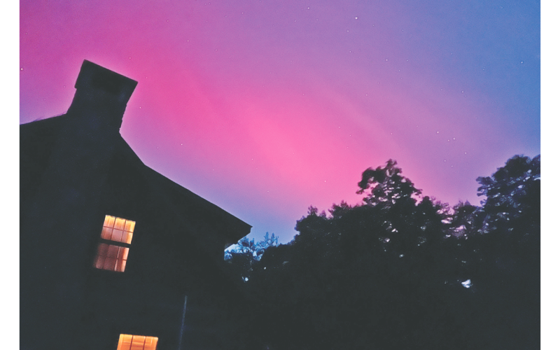 A surprise appearance of the Northern Lights above Lumpkin County resulted in many colorful pictures of the solar storm, including this one by Keith Krayanek who was able to snap a shot of the pinkish tinged-sky over his Ben Higgins Road residence.