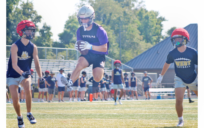 Indians’ player Colton Lee leaps into the end zone during the seven-on-seven event at East Forsyth last week.
