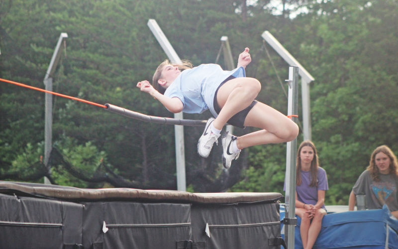 Lumpkin County athlete Brynli Gilreath demonstrates how to do a high jump during the recent summer camp.