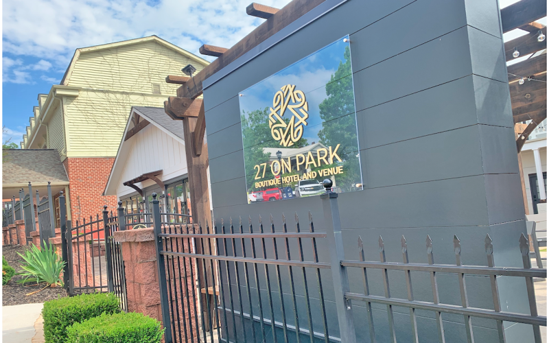 27 on Park Boutique Hotel and Venue owner Dustin Kennedy is hoping for a variance that would allow for his sign to remain on the edge of this South Park Street property.