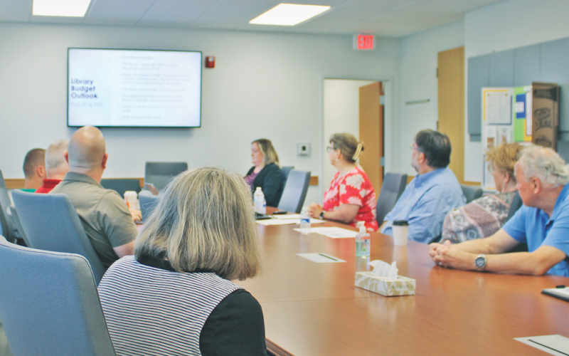 Chestatee Regional Library Director Leslie Clark and Business Manager Jonathan Smith present the local library's 2025 budget outlook to the Lumpkin County Board of Commissioners.