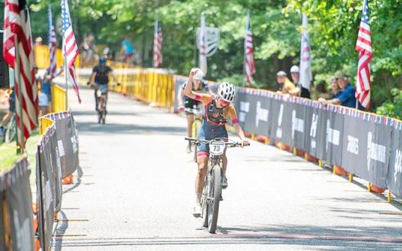 Shiloh Claussen celebrates crossing the finish line at MTB Marathon Nationals. (submitted photo)