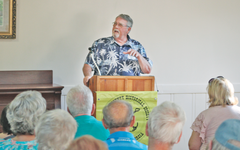 Alan McDonald speaks to the Lumpkin County Historical Society about his relative Jesse McDonald’s historic house located in what is now Yahoola Creek Park.