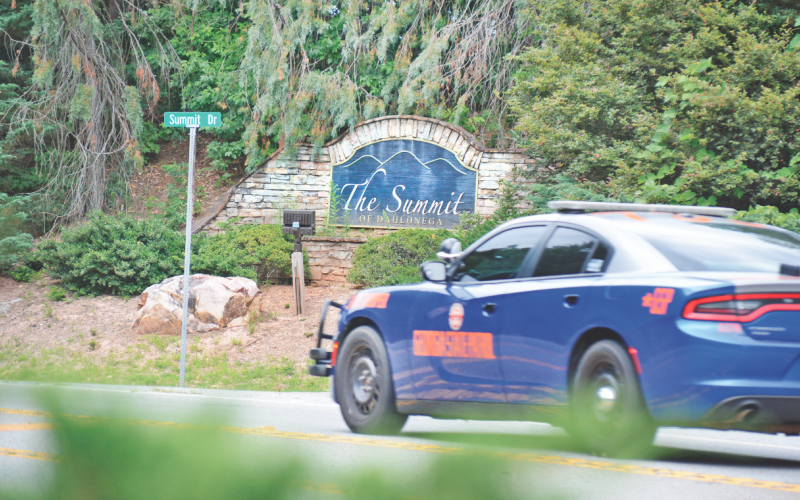 The County, City and GDOT are working on a solution that would bring flashing safety signs to both sides of The Summit entrance.