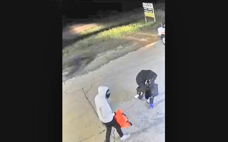 Surveillance cameras caught culprits in the act of a destructive burglary of a local pawn shop last Tuesday morning.