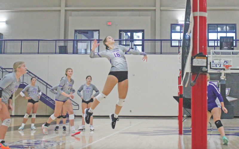 Lumpkin County player Maggie McKenzie lines up a spike during a scrimmage game last week.