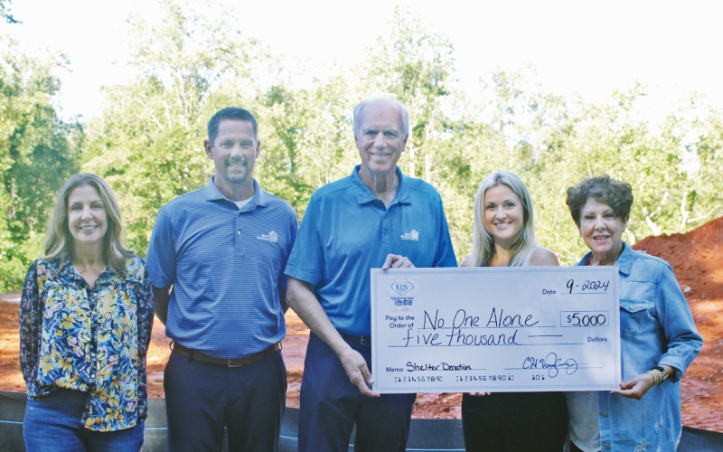 Pictured at the site of the future NOA shelter are (from left) Shelter Campaign Chair Tracy Unger, County Commissioner Tucker Greene, President Emeritus Chip Vaughan, NOA Executive Director Cara Ledford and NOA Board Chair Joanie Cullity.