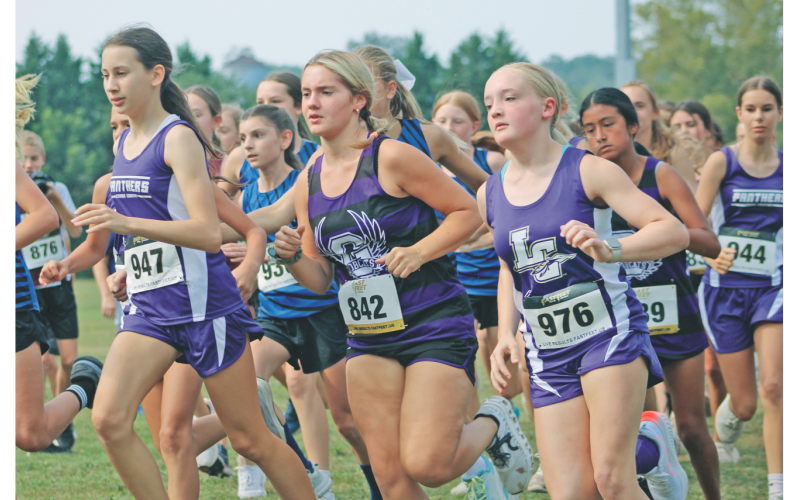 Lumpkin County runner Kiersten Powell fights for a good position during last week’s race in Blue Ridge.