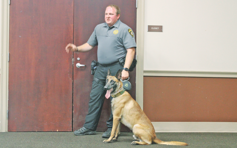 Deputy Austin Brown introduces his K-9 co-worker, Kade, to a gathering of the Sheriff’s Volunteer Organization. The SVO raised funds to purchase the new canine officer.