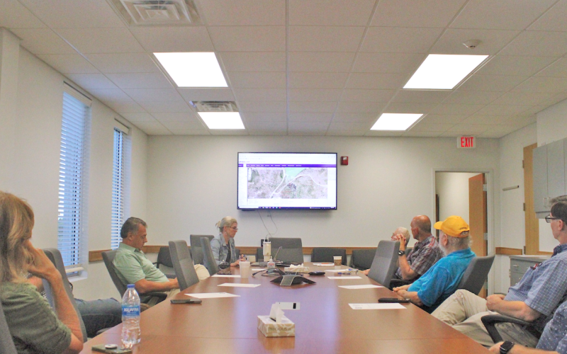 Members of the Yahoola Creek Reservoir Committee met earlier this week to review a revised schematic concept for a new parking area, walking track, pavilion and restrooms to be located off of Rock House Road.