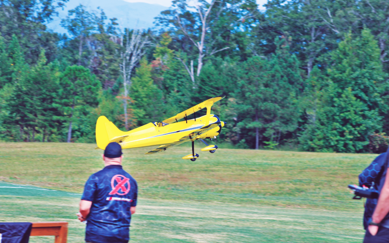A pilot commandeers his remote control biplane during last year’s Extreme Fun-Fest Fly-in. The annual RC airshow attracts participants from across the country and serves as the largest fundraiser for North Georgia Model Aviators, a charity group focusing on education and community participation.