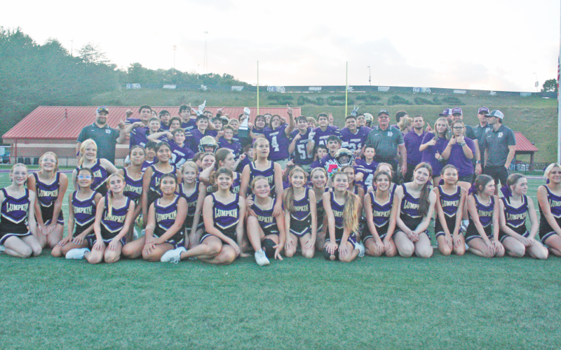 The Lumpkin County Middle School football team and cheer squad celebrate their big win over Fannin County in the finals.