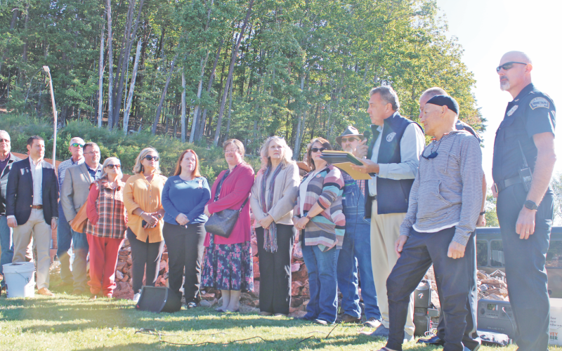 Senator Steve Gooch reads aloud the text of Senate Resolution 609, which codifies the legend of a Cherokee woman named Trahlyta and authorizes the DOT to erect and maintain its own signage at Stone Pile Gap.