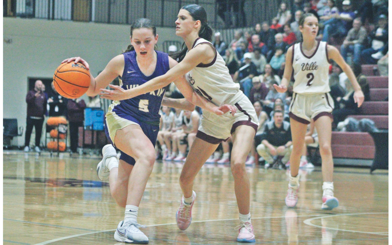 Lumpkin County’s Emmie Kate Reece gets past a Dawson County defender in the two team’s recent matchup.