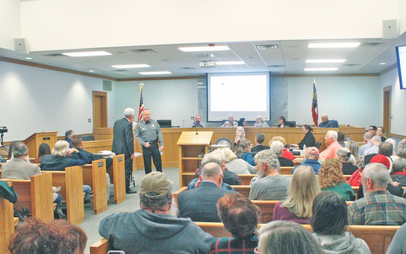 A packed crowd gathered in the Commissioner’s Boardroom last Monday night in anticipation of the DiVine Village appeal hearing. Ultimately, the Planning Commission voted to uphold an administrative denial of increased density for the development.