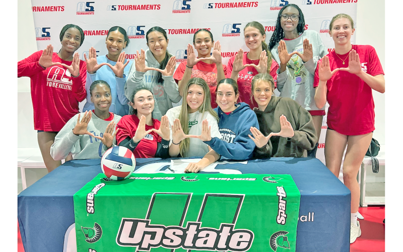 Morgan Powell and her A5 Volleyball teammates celebrate her commitment to the University of South Carolina Upstate.
