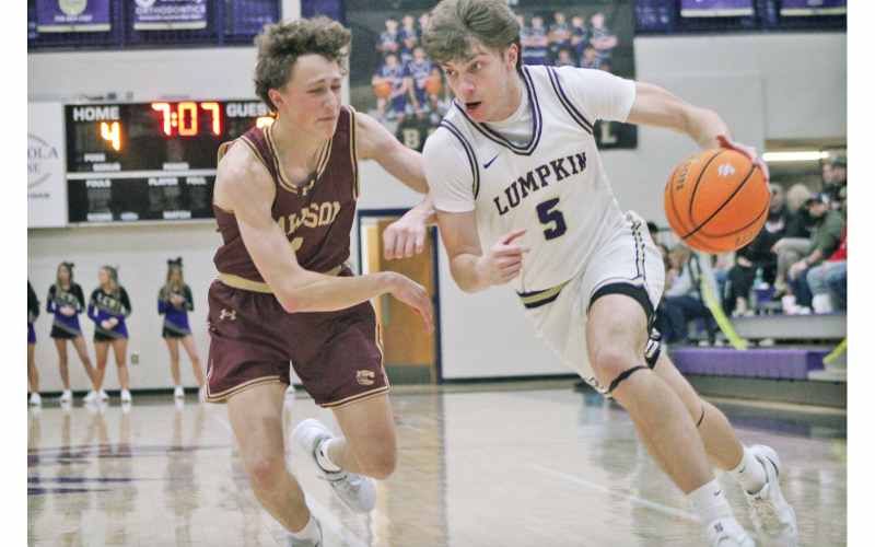 Lumpkin County’s TJ Gaddis blows past a Dawson defender during this week’s game.