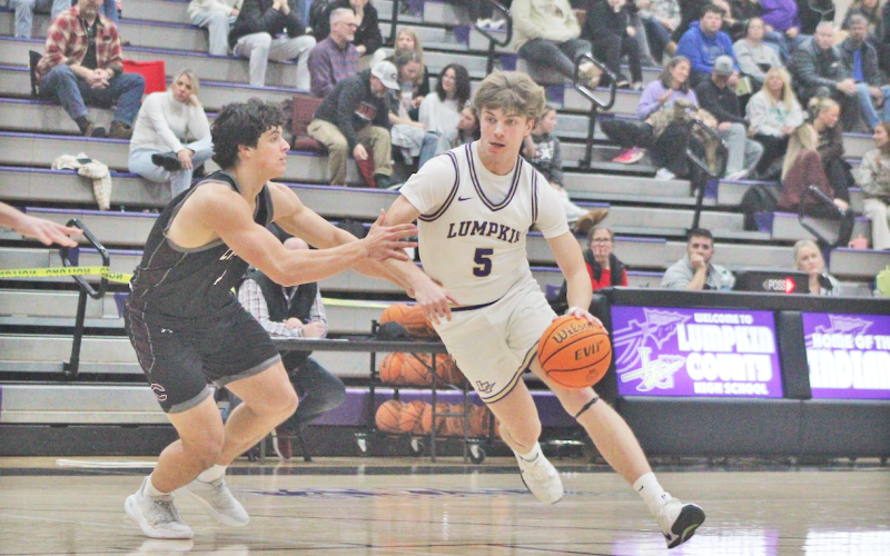 Lumpkin County’s TJ Gaddis drives down the court during last week’s game against Chestatee.