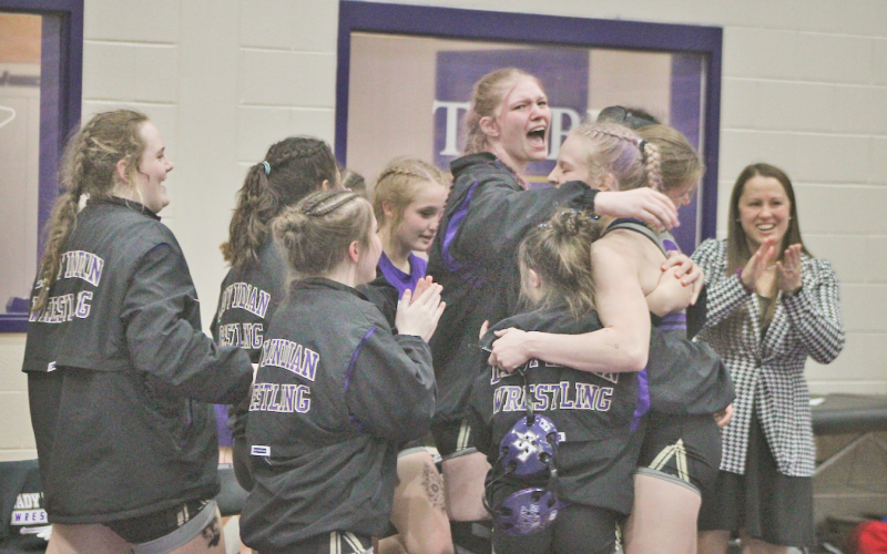 Maxine Sullens and the Lumpkin County High School team celebrate their State Championship victory.