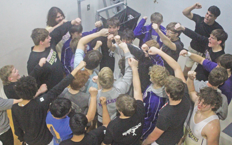 The Lumpkin County High School wrestling team breaks things down ahead of its finals match against Dawson.