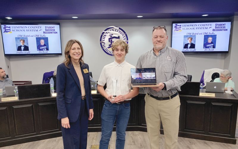 Jonathan Wright was honored as the LCHS STAR student at a recent school board meeting. Pictured, from left, are Superintendent Sharon Head, Wright, LCHS Principal Brian Matthews and a virtual STAR teacher Don Brock (on the laptop).