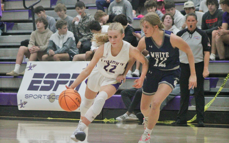 Lumpkin County player Anna Davis drives down the court for the Lady Indians.