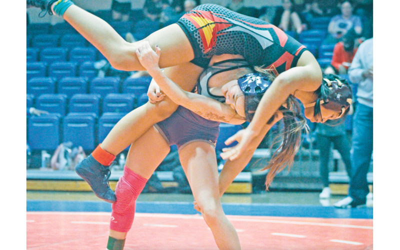 Cadence Grulla lands a big throw against an opponent. Grulla was one of several wrestlers to advance to Sectionals to represent Lumpkin. (photo by Eligha Roper)