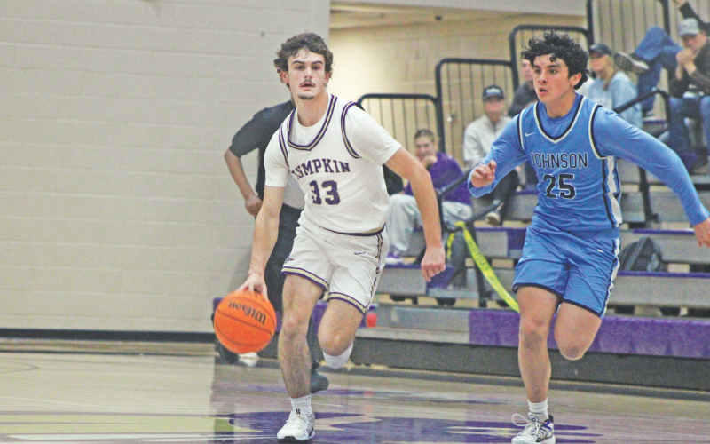 Lumpkin County’s Landon Pierce drives down the court for the Indians during last week’s face-off against Johnson.