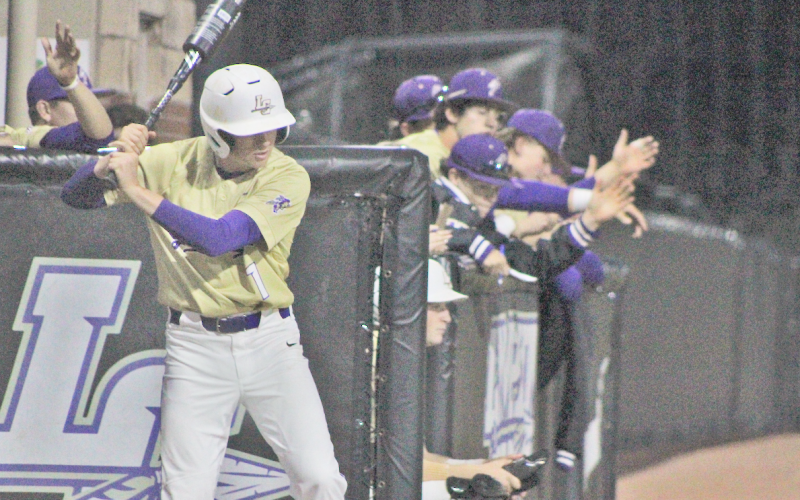 Lumpkin County’s Carson Horton takes some practice swings before stepping up to the plate.