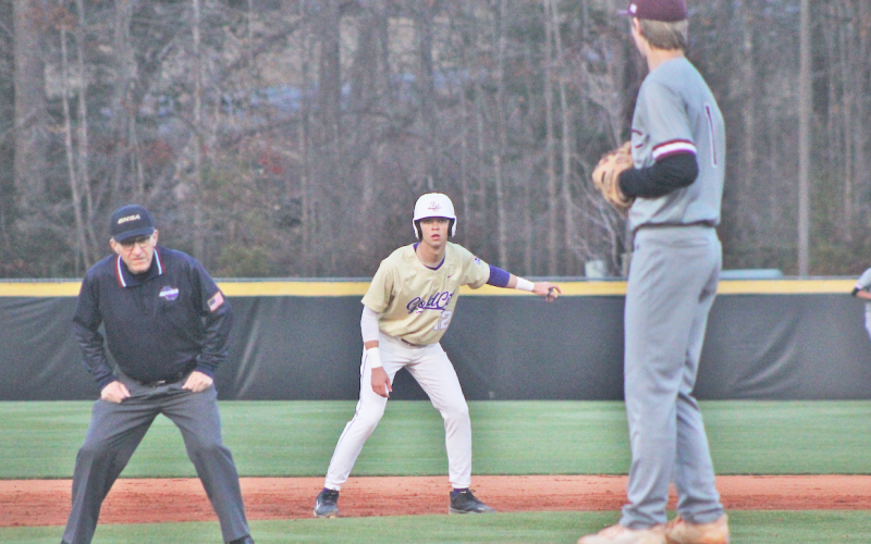 Lumpkin County’s Chase Smith plays mind games with the Chestatee pitcher while waiting at second base.