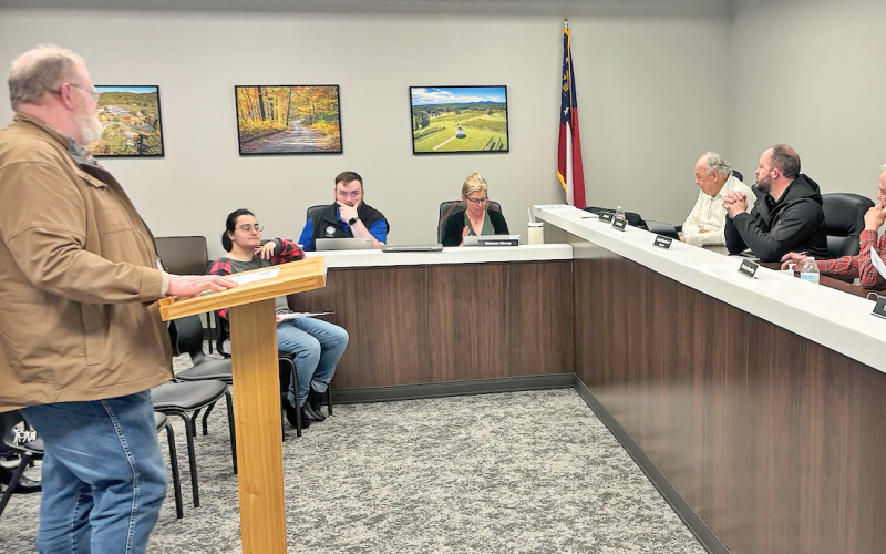 Larry Reiter addresses the Lumpkin County Planning Commission as the group entertains a variance request for a new convenience store on Auraria Road.