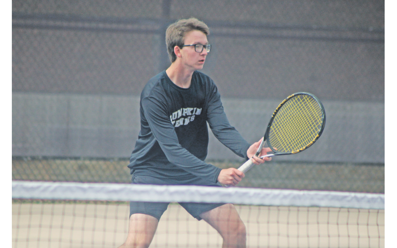Barrett Wilkinson awaits a serve from his Johnson opponent.
